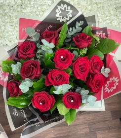 12 red rose hand tied