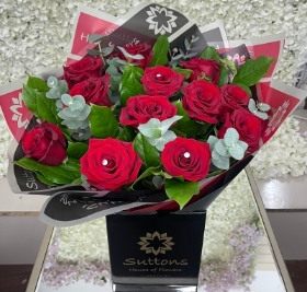 12 red rose hand tied